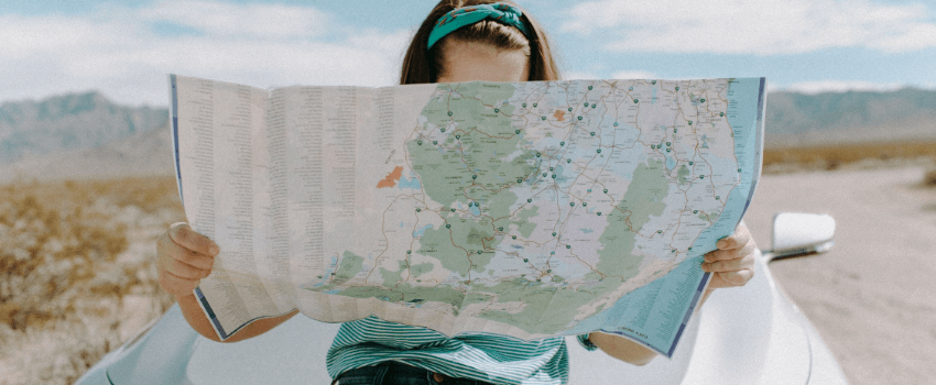 woman holding travel map